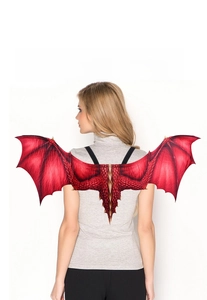 Detail view of red dragon wings featuring realistic scale patterns and elastic straps