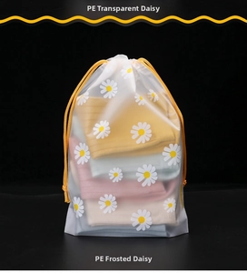 Detail of frosted daisy drawstring storage bag showing PE texture and colorful sock inside