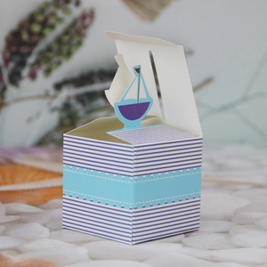 Blue and white striped nautical sailboat candy box for baby birthday favors