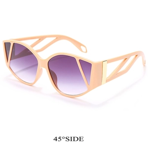 45-degree side view of geometric oversized cat eye sunglasses in nude pink with purple lenses