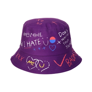 Close-up of purple cotton bucket hat with colorful street style graffiti and letter print