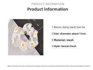 Detail view of a 11cm white daisy mesh hair scrunchie with floral pattern