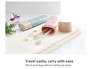 Detail of floral embossed texture on pink and green portable travel toothbrush cases