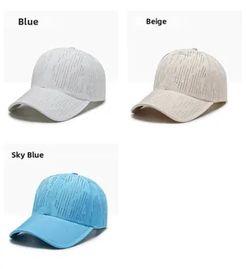 Close-up of laser-cut perforated fabric on breathable quick-dry summer baseball caps