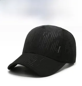 Detail of laser-cut perforations on black quick-dry baseball cap for enhanced breathability