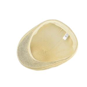 Close-up of beige mesh beret showing breathable polyester knit and inner sweatband