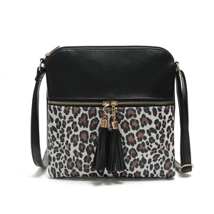 Women's shoulder bag with leopard print panel and double leather tassel pendants