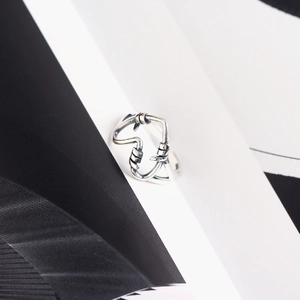 Minimalist 925 sterling silver handmade wire-wrapped heart ring with abstract design
