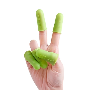 Five pieces of green silicone finger protectors with non-slip texture on a white background