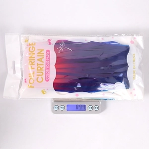 Macaron foil fringe curtain in gradient purple packaging being weighed at 89.4g