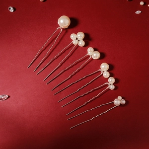 Elegant 6-piece pearl hair pin set with gold wavy pins for bridal hair styling