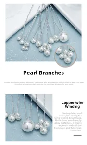 Macro shot of pearl hair pin set with silver wire wrapping and eco-friendly alloy