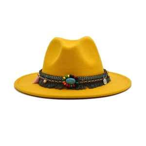 Bright yellow wide-brim fedora with ethnic beaded band and bohemian tassel details