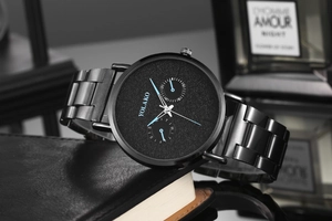 Detail of YOLAKO men's ultra-thin quartz watch with starry dial and matte steel band