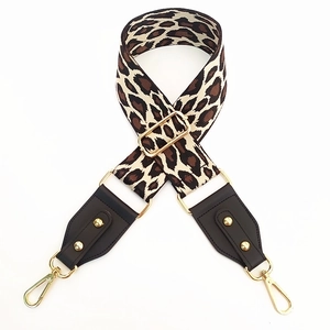 Adjustable leopard print wide fabric shoulder strap with brown leather and gold hardware