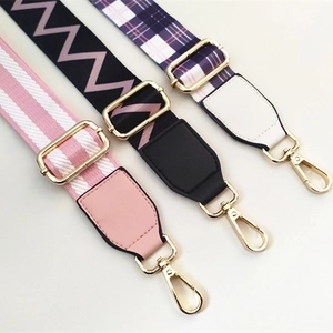 Three colorful ethnic style nylon shoulder straps with gold hardware and leather ends