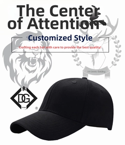 Detail of a black six-panel baseball cap showing cotton fabric and breathable eyelets