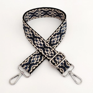 Detail of 3.8cm jacquard ethnic geometric bag strap with silver swivel metal hooks
