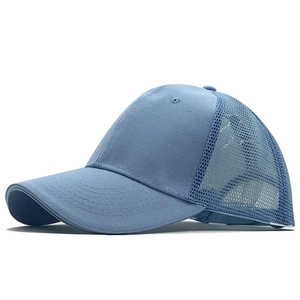 Detail of sky blue trucker cap showing breathable mesh back and curved brim for sun protection