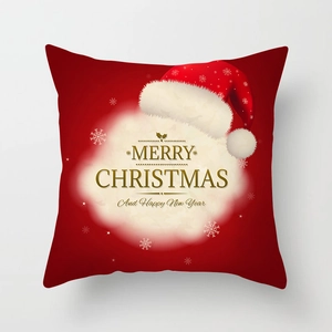 Detailed view of red Christmas pillowcase with Merry Christmas and Happy New Year print