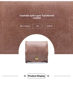 Detail of durable split cowhide leather material and metal snap closure on a brown mini pouch