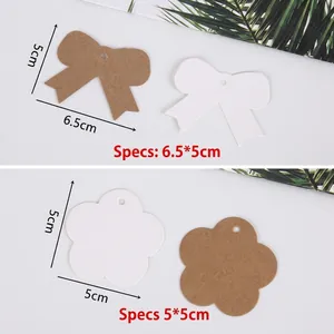 Vintage kraft paper tags in bow and flower shapes for DIY gifts and labeling