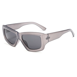Fashionable thick frame rectangular sunglasses in transparent grey with dark lenses