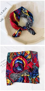 Detail view of the colorful abstract art print on a premium silk-like square neck scarf