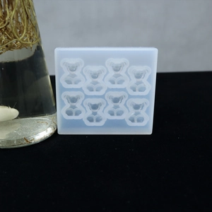Macro detail of 8-cavity bear silicone mold for DIY resin crafts and candle making