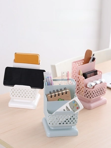 Three-tier hollow desk organizer with phone holder and multi-compartment storage slots