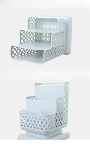 Close-up of a 3-tier hollow desktop organizer with breathable grid pattern and tiered design