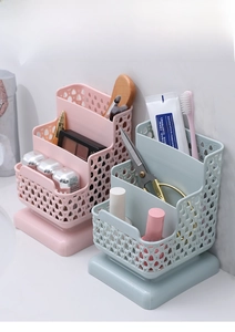 Close-up of three-tier hollow desk organizer with woven texture for cosmetics and pens