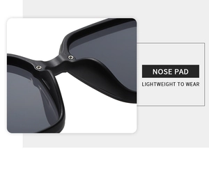 Detail of lightweight integrated nose pads on black sunglasses with metal screw reinforcement
