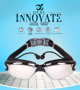 Detail view of professional swim goggles with electroplated lenses and integrated earplugs