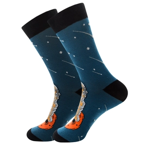 Detail of dark blue crew socks with orange and gray astronaut space patterns