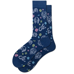 Detailed close-up of navy blue crew socks with white constellation patterns and colorful stars