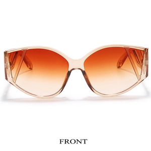 Front view of amber tortoiseshell sunglasses with brown gradient cat-eye lenses