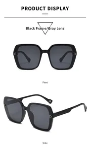 Detailed macro view of square oversized sunglasses featuring sparkling side glitter accents