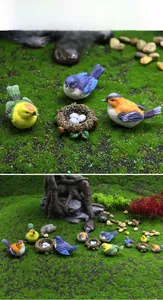 Miniature resin bird nest set with colorful artificial birds and speckled eggs for garden decor