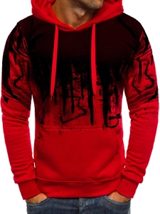 Close-up of red and black gradient hoodie with ink splash print and kangaroo pocket