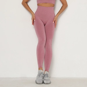 Detail of rose pink seamless knitted yoga set with high waist leggings and sports vest