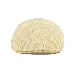 Close-up of the breathable mesh texture and woven pattern on this beige flat cap