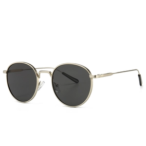 Classic round golden metal sunglasses with dark gray lenses for a retro fashion style