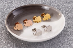 Detailed view of elephant stud earrings in gold, rose gold and silver finishes with rhinestones