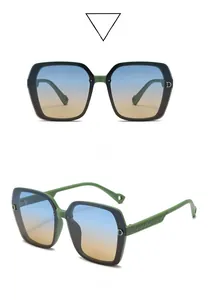 Detail of green frame sunglasses with gradient lenses and glitter texture on side temples