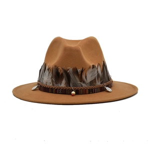 Camel wide brim fedora hat featuring ethnic feather band and bead embellishments