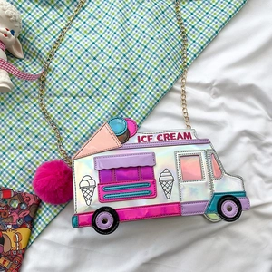Close-up of laser finish ice cream truck crossbody bag with pink pompom and gold chain
