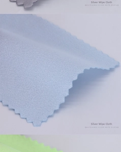Microfiber silver polishing cloths in grey and blue with decorative zigzag edges