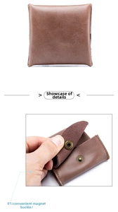 Detail view of small brown leather coin purse with a convenient magnetic snap closure