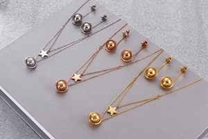 Detailed view of star and planet jewelry sets in silver, rose gold, and gold finishes
